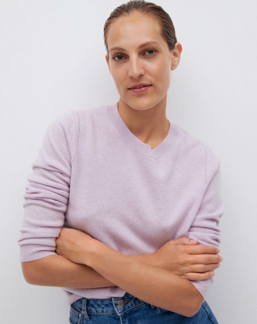 top view of model wearing pink sweater