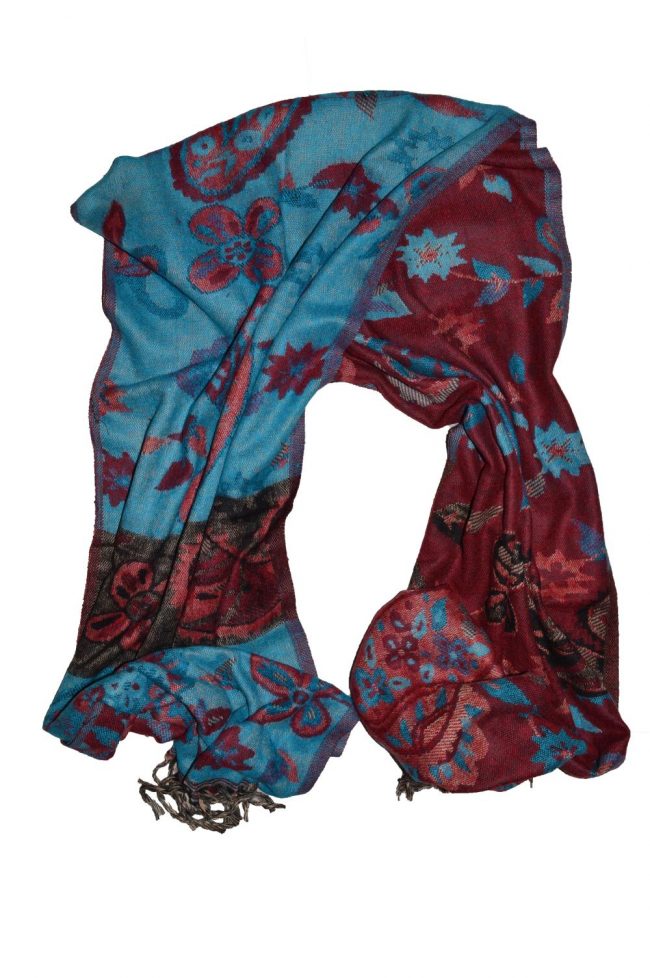 red and teal printed scarf on white background